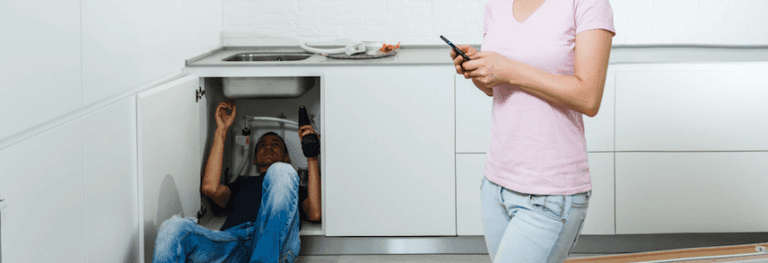 plumber under sink