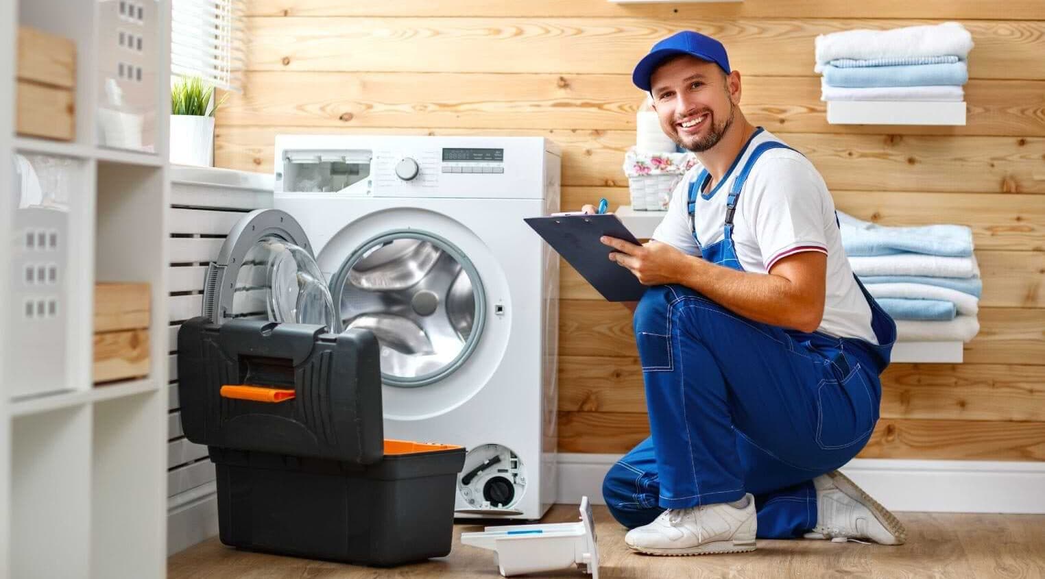 Technician Next To A Washing Machine 1 Aspect Ratio 1472 816