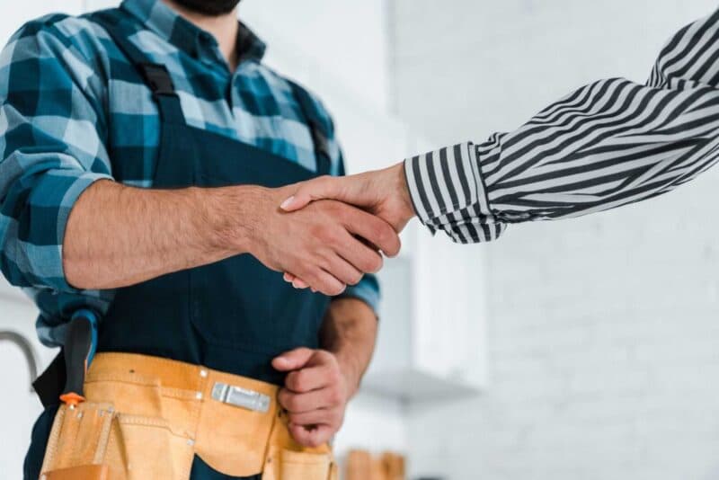 Plumber Shakes Hand