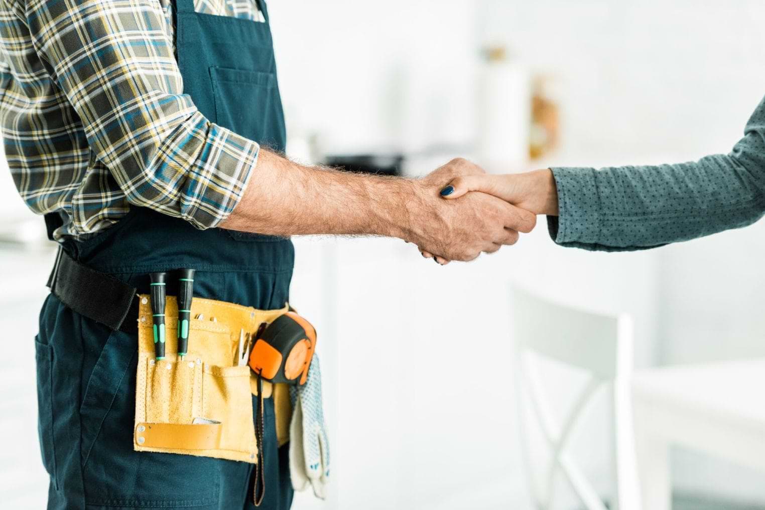 Technician Shakes Hand With A Client