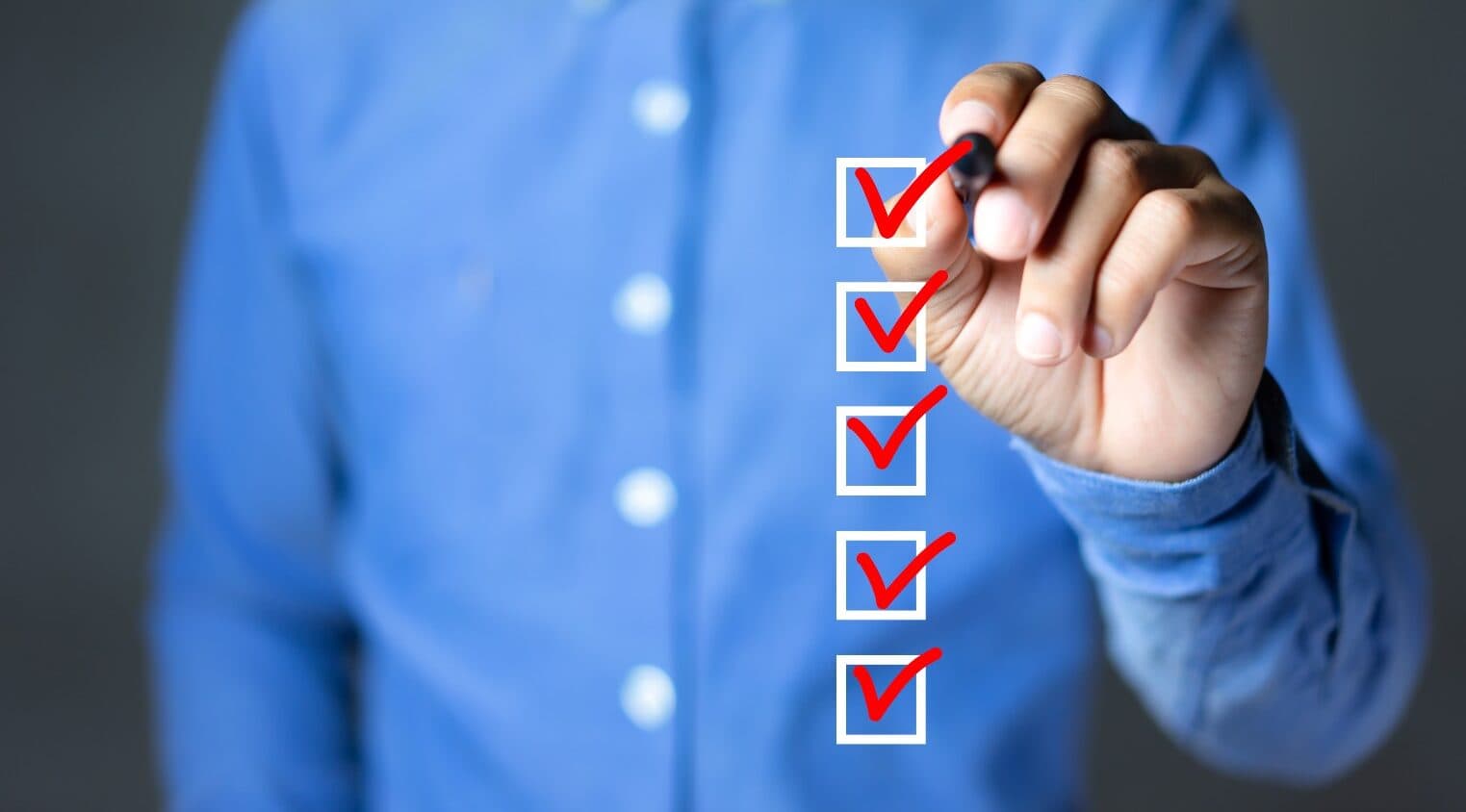 Businessman Marking A Checklist Aspect Ratio 1472 816