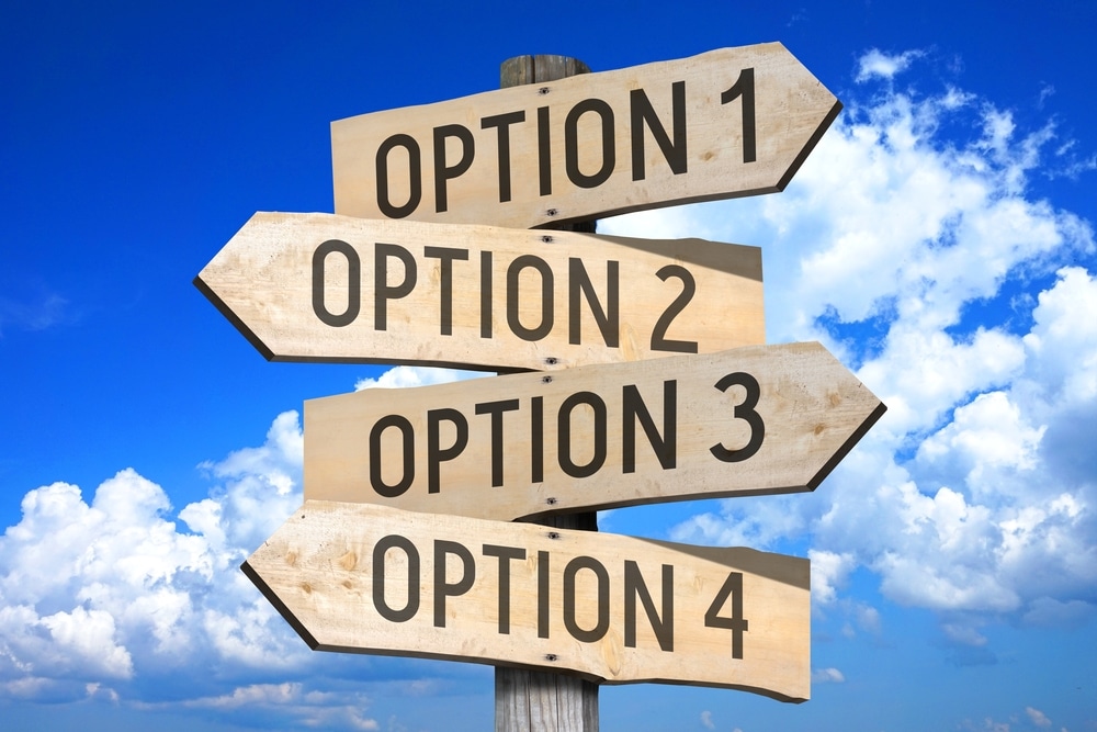 A sign pointing at multiple options