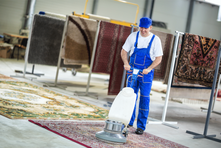 vacuuming in a rug store