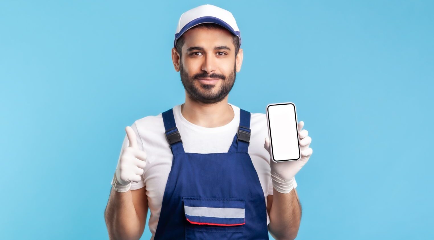 Plumber With A Mobile Phone Aspect Ratio 1472 816