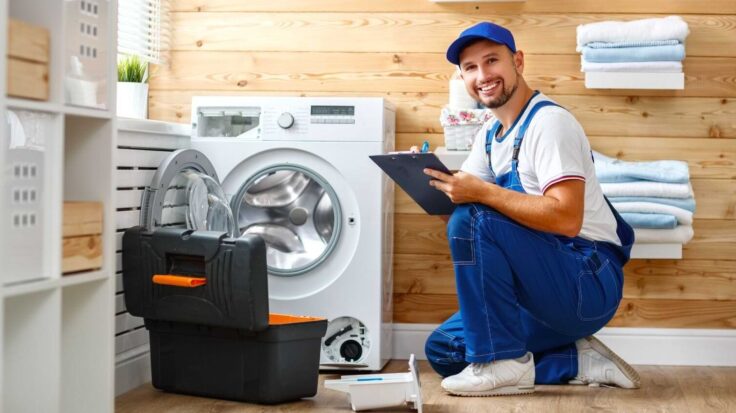 Technician Next To A Washing Machine 1 Aspect Ratio 1472 816