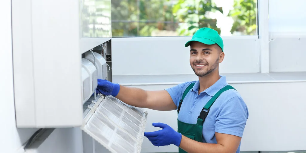Hvac Technician Cleaning Filters